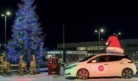 Елхата на Nissan грейна благодарение на електрически Leaf